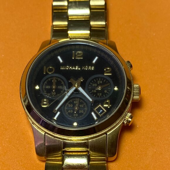 Michael Kors Ladies Black/Yellow Gold Toned Watch - Picture 1 of 4